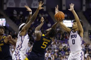 Short-handed TCU holds off WVU without star guard Mike Miles Jr.